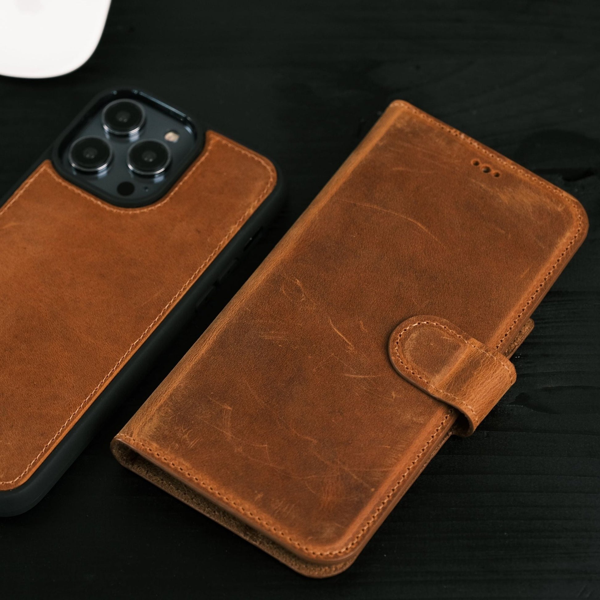 Toronata Casper Leather Wallet in various styles, compatible with iPhone 15 Series, featuring a magnetic detachable design, MagSafe compatibility, RFID protection, and a kickstand. Each variant showcases handcrafted genuine leather, multiple card slots, and a secure, functional design for sophisticated protection and style.